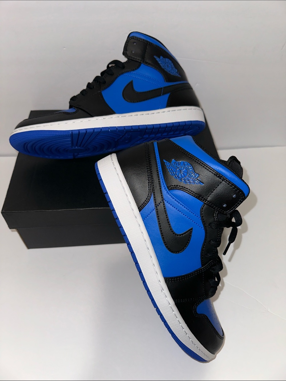 Nike Air Jordan 1 Mid — Black and Royal Blue